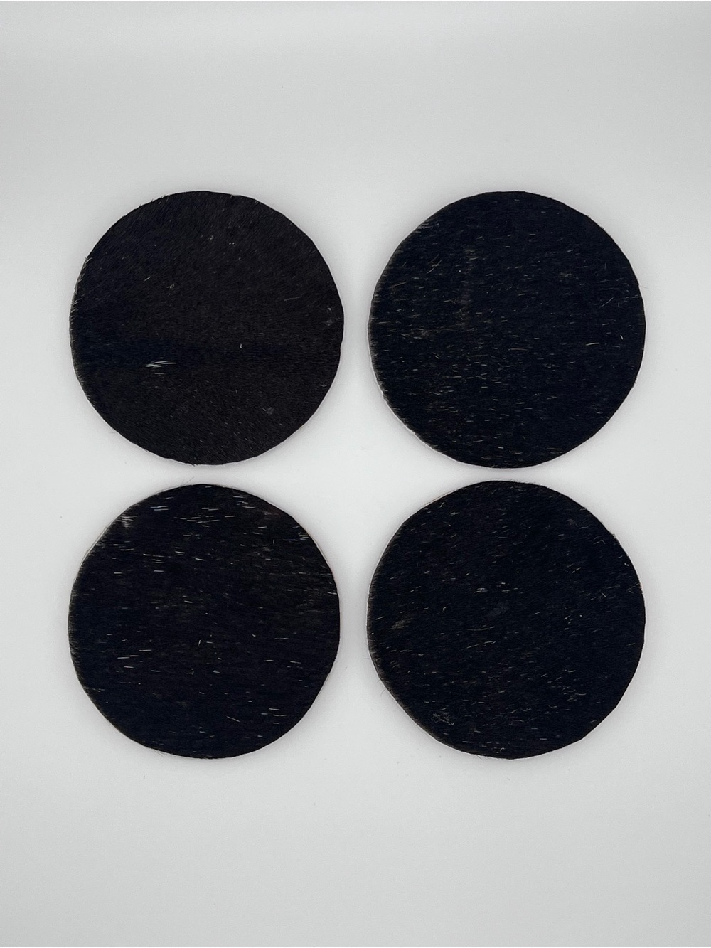 Black Round Fur Coasters - Set of 4
